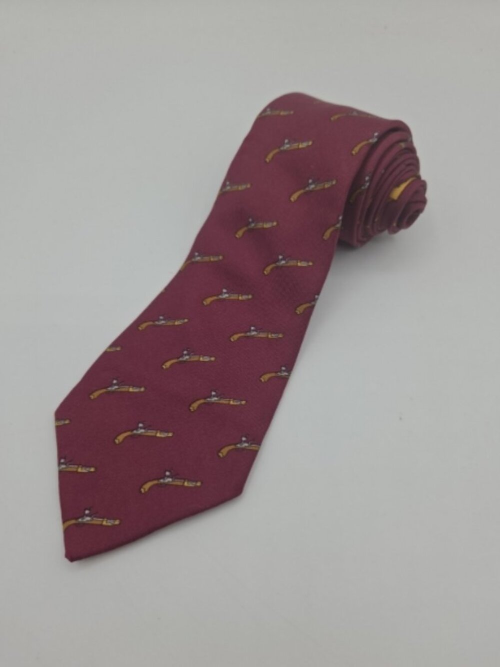 Hermès Paris Silk Tie Burgundy Flintlock Pistol Motif Made In France